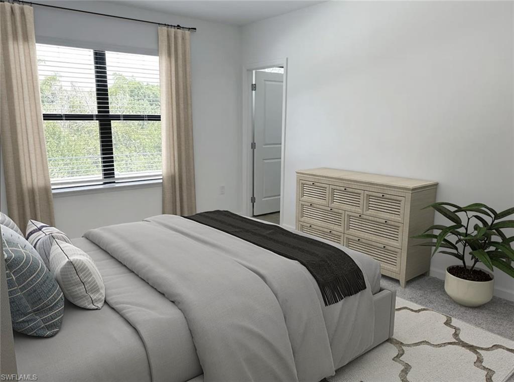Virtually staged carpeted empty room with baseboards
