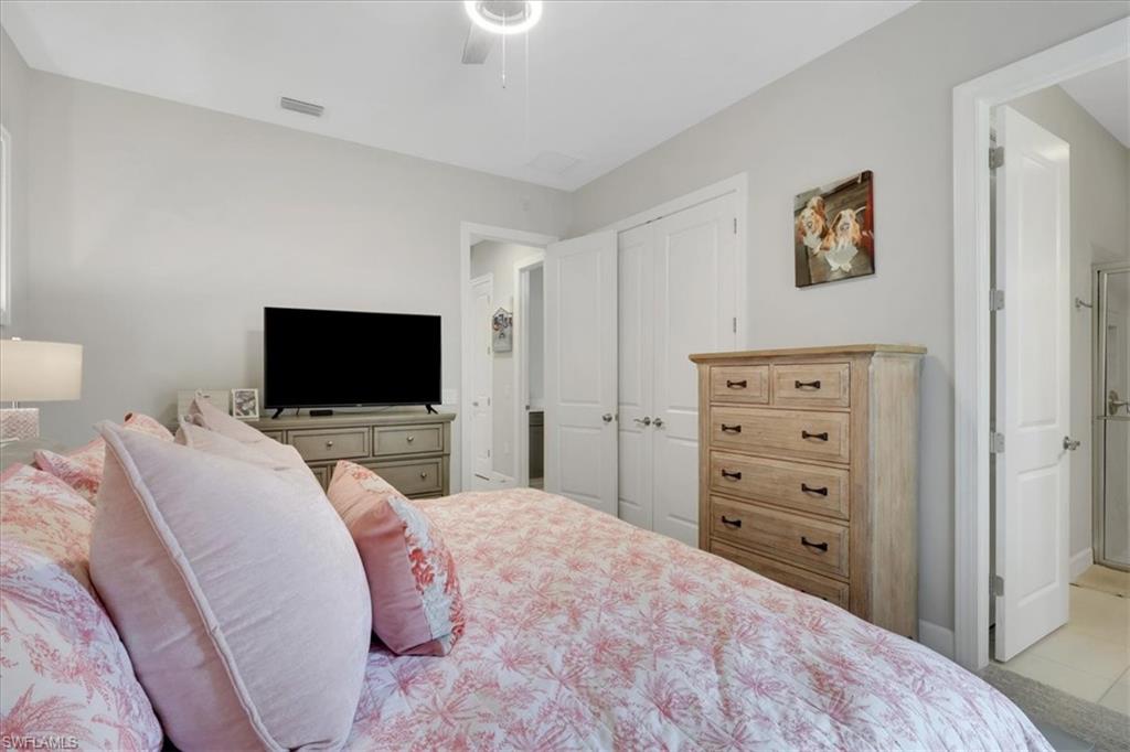 Bedroom featuring a closet and a ceiling fan