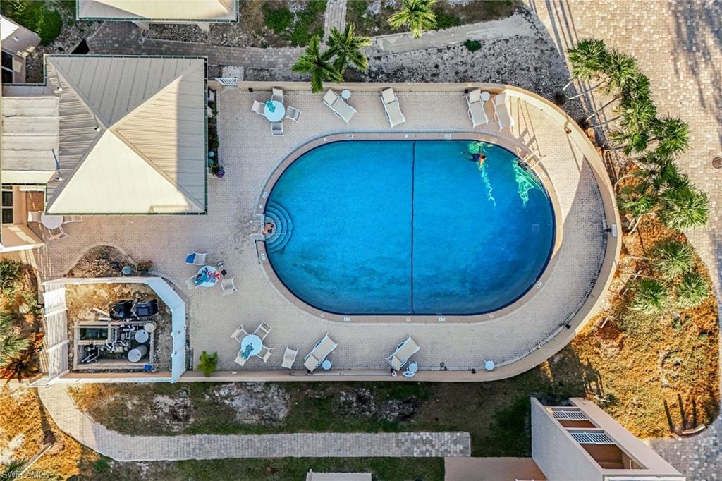 Community pool featuring a patio area