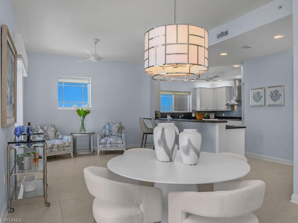 Looking toward kitchen; another dining area is alongside.