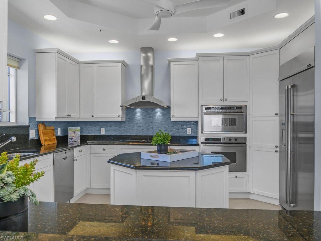 Wonderful light, abundant storage and plenty of prep surface area.  Enjoy mingling with your guests when entertaining.