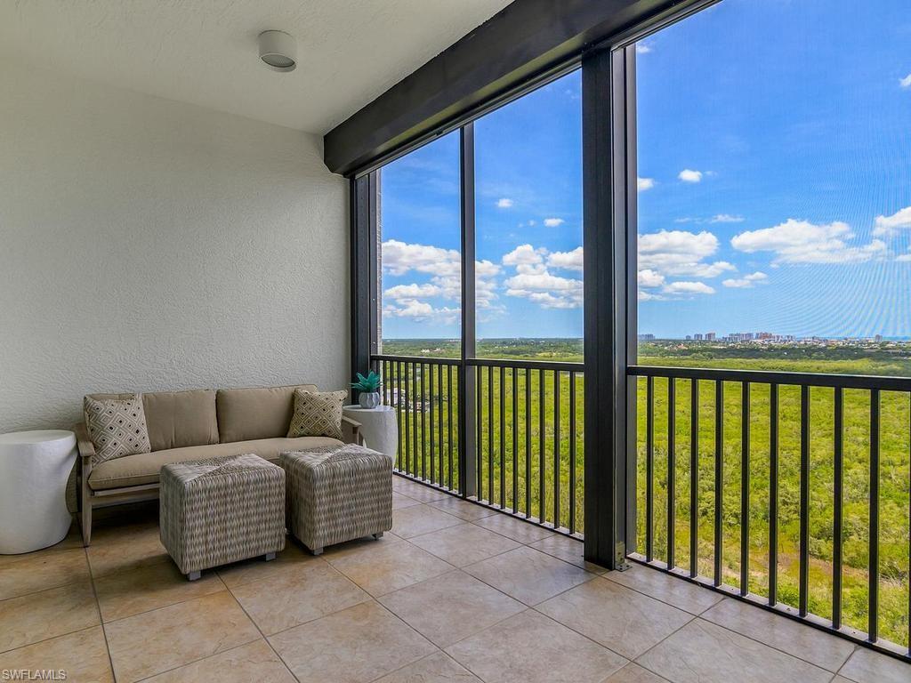 Breezy relaxation awaits on expansive master BR lanai.  Views for days!
