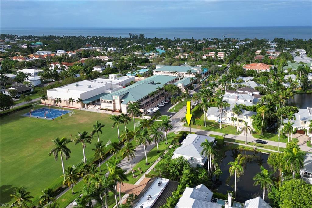Aerial view of residential area with a large body of water