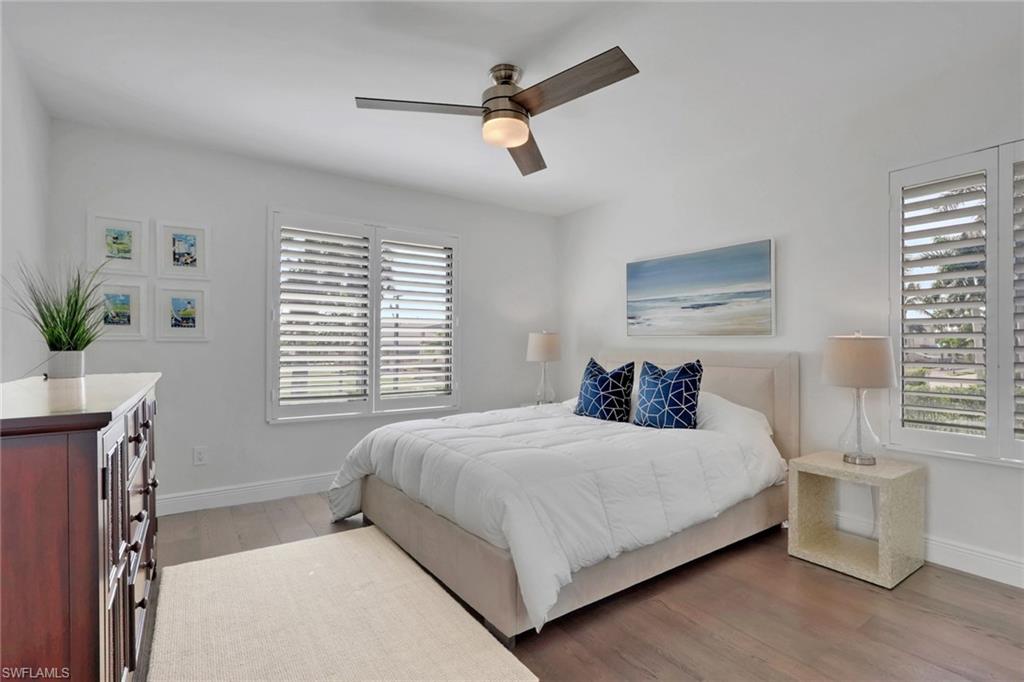 Bedroom featuring light wood-type flooring and ceiling fan