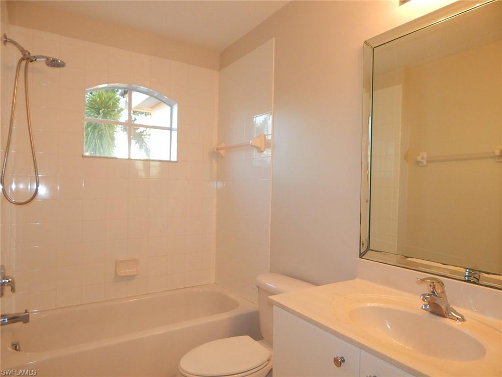 Guest bathroom featuring vanity and shower / bathtub combination