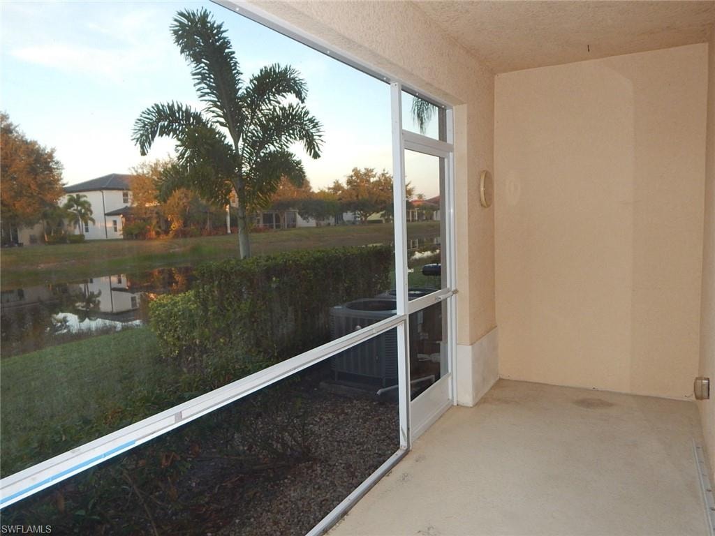 Unfurnished sunroom with a water view