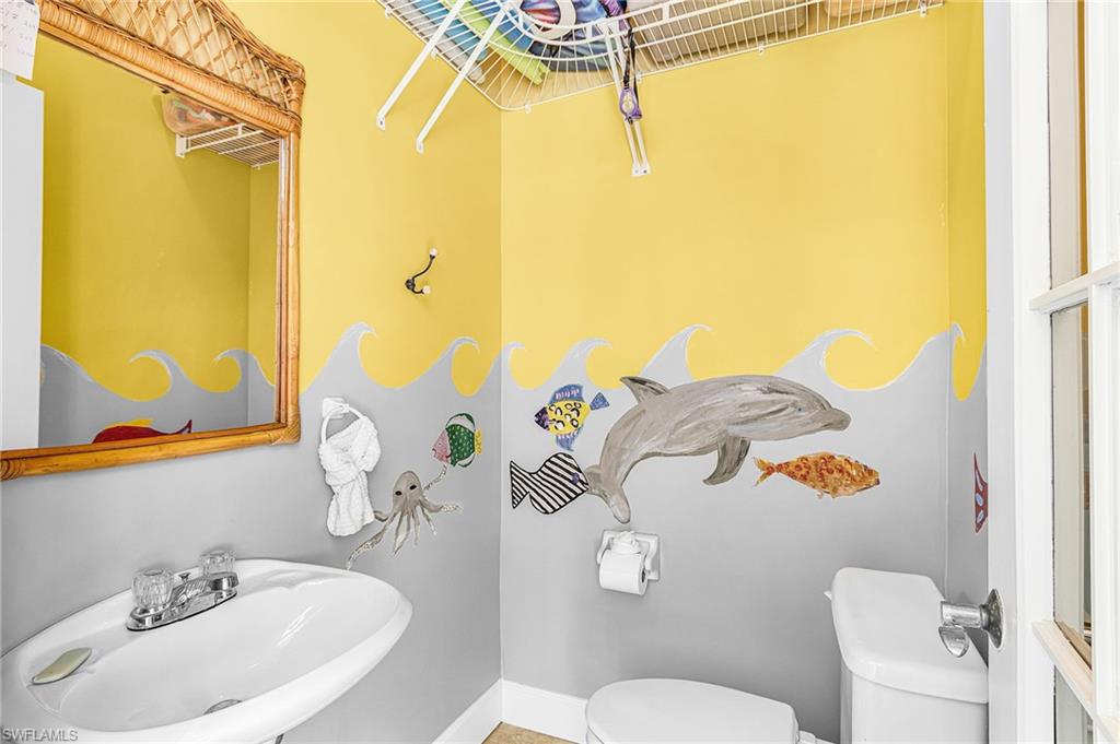 Bathroom featuring a sink and toilet