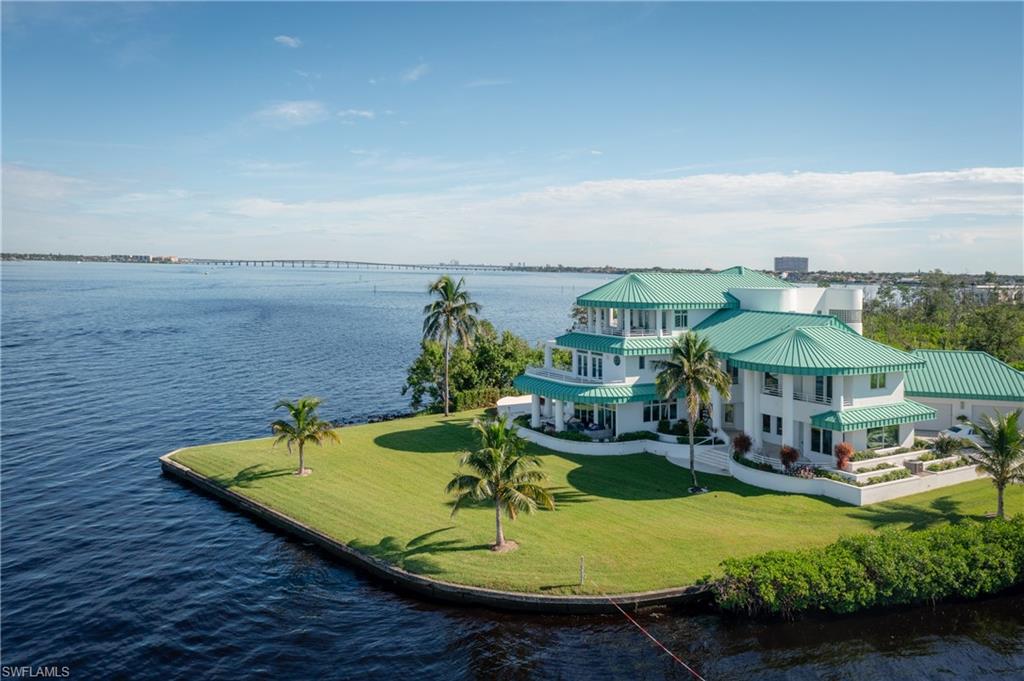 View from above of property with a nearby body of water