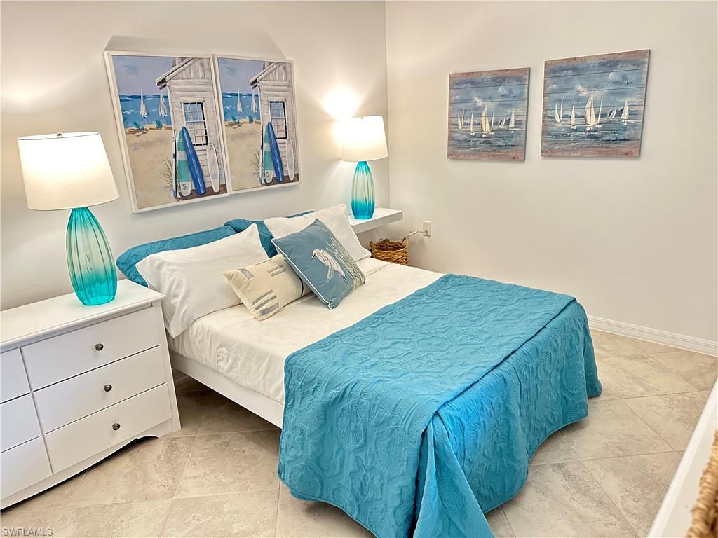 Bedroom with tile patterned flooring