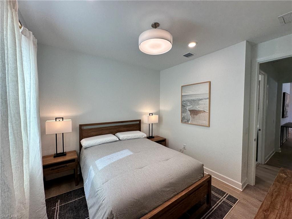Bedroom featuring baseboards and recessed lighting