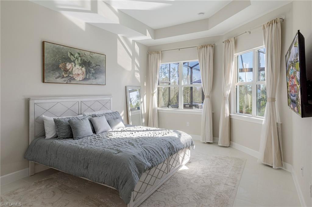 Bedroom featuring multiple windows