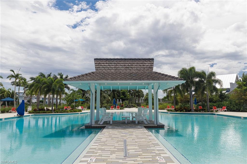 View of pool featuring a gazebo and a patio