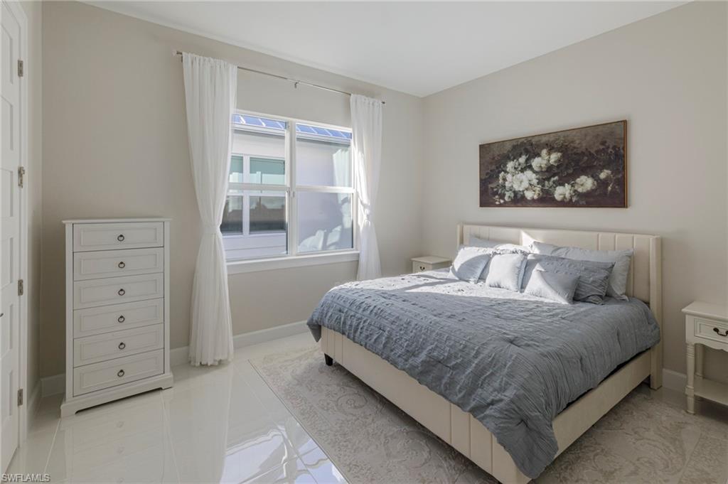 Bedroom featuring light tile patterned floors