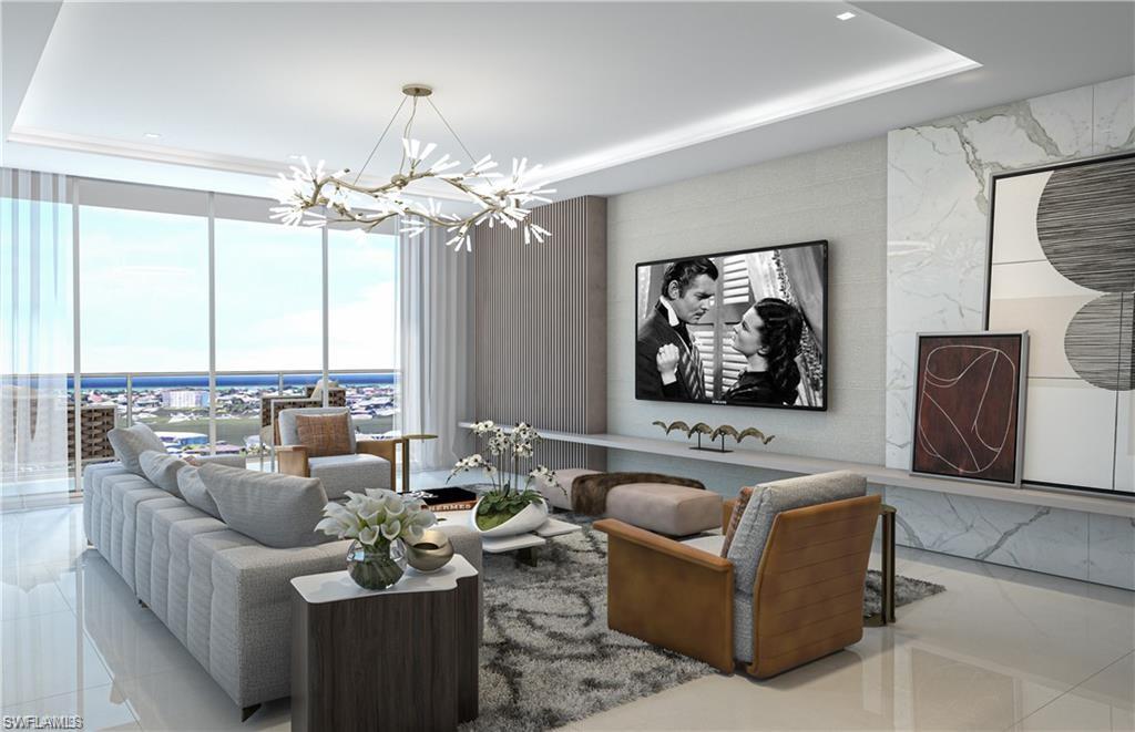 Living room featuring a tray ceiling, expansive windows, and tile patterned flooring