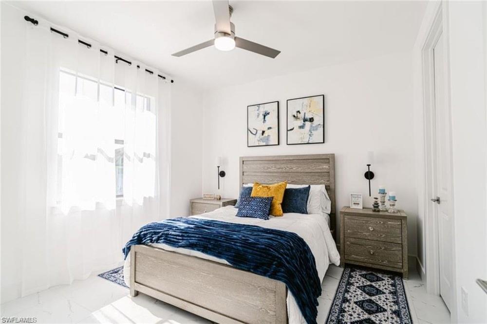 Bedroom with tile finish floors and a ceiling fan