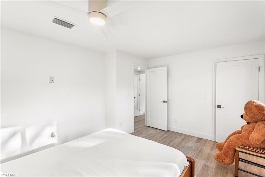 Bedroom featuring light wood finished floors and ceiling fan