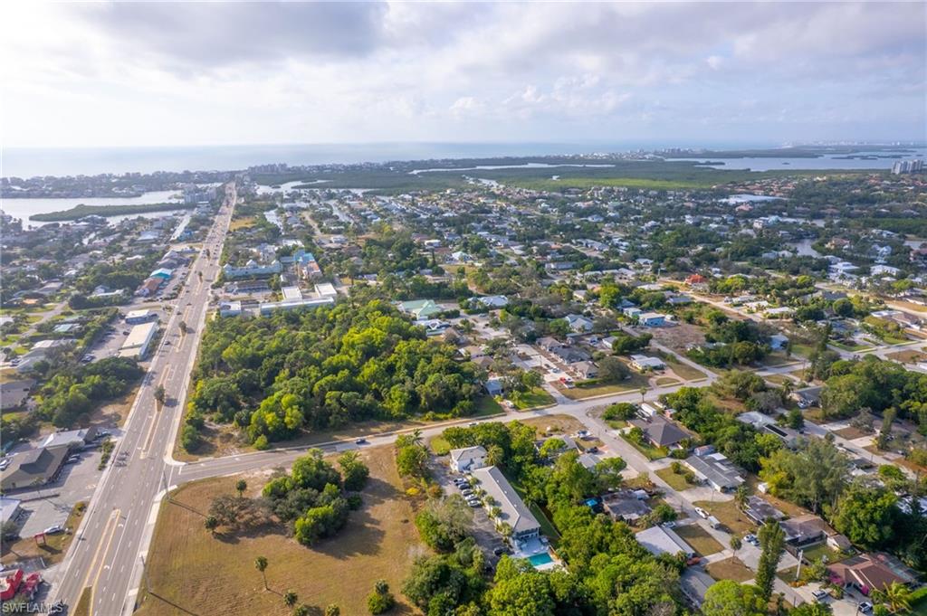 Aerial view of property facing West and surrounding area featuring Bonita Beach