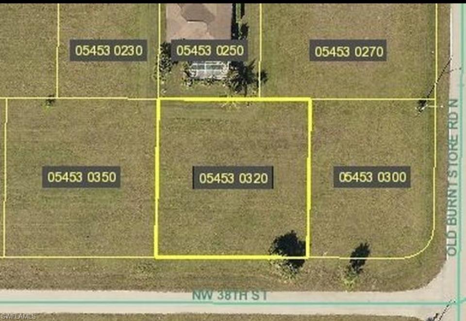 Aerial map of property and surrounding area featuring property parcel outlined
