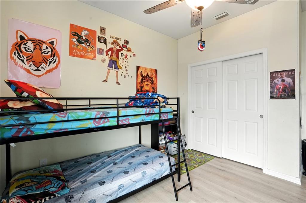 Office featuring light wood finished floors and ceiling fan