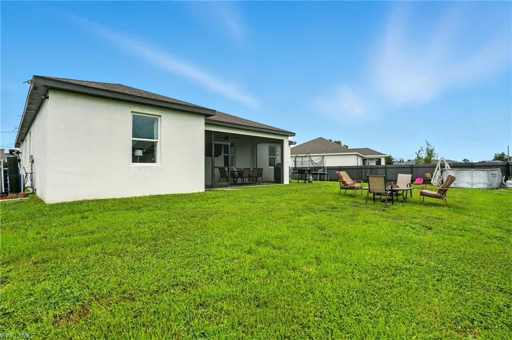 View of fenced backyard