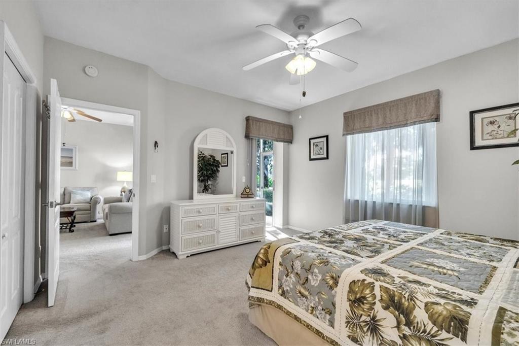 Bedroom with carpet and a ceiling fan