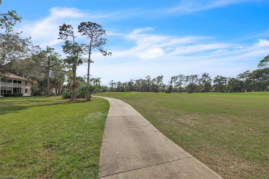 View of home's community featuring a view of golf