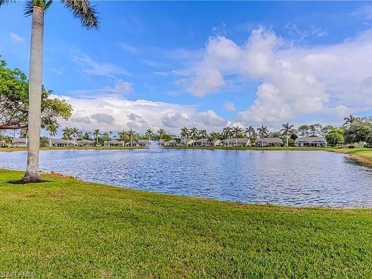 Water view featuring nearby suburban area