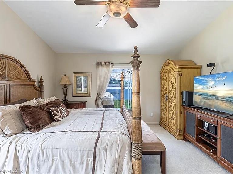Bedroom featuring carpet flooring and ceiling fan