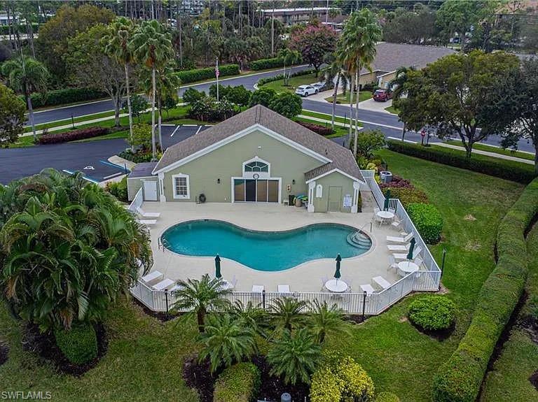 Community pool featuring a patio area