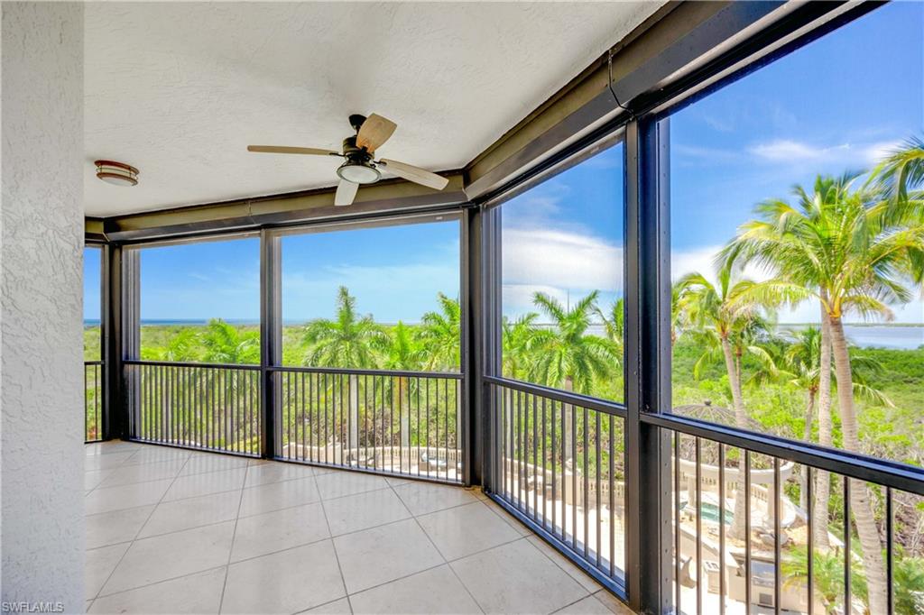 covered screened lanai that has access from the master and living room