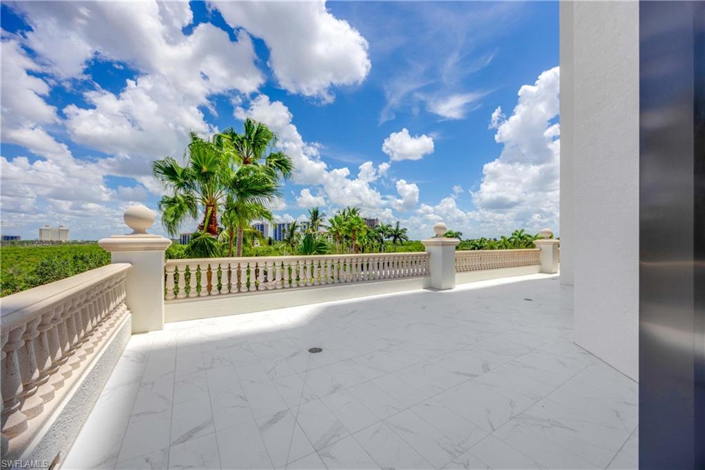 Incredible exterior space for entertaining with beautiful view of the bay
