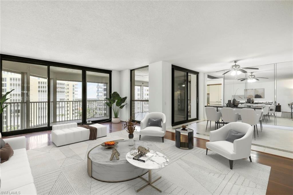 Virtually staged living room and dining room.