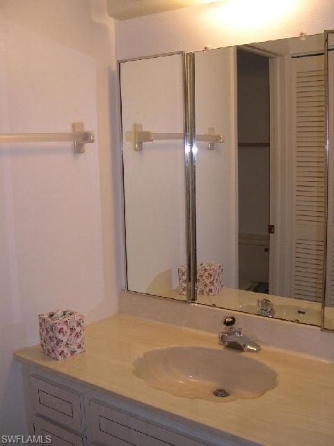 Primary bathroom with separate sink/vanity area. Walk in shower.