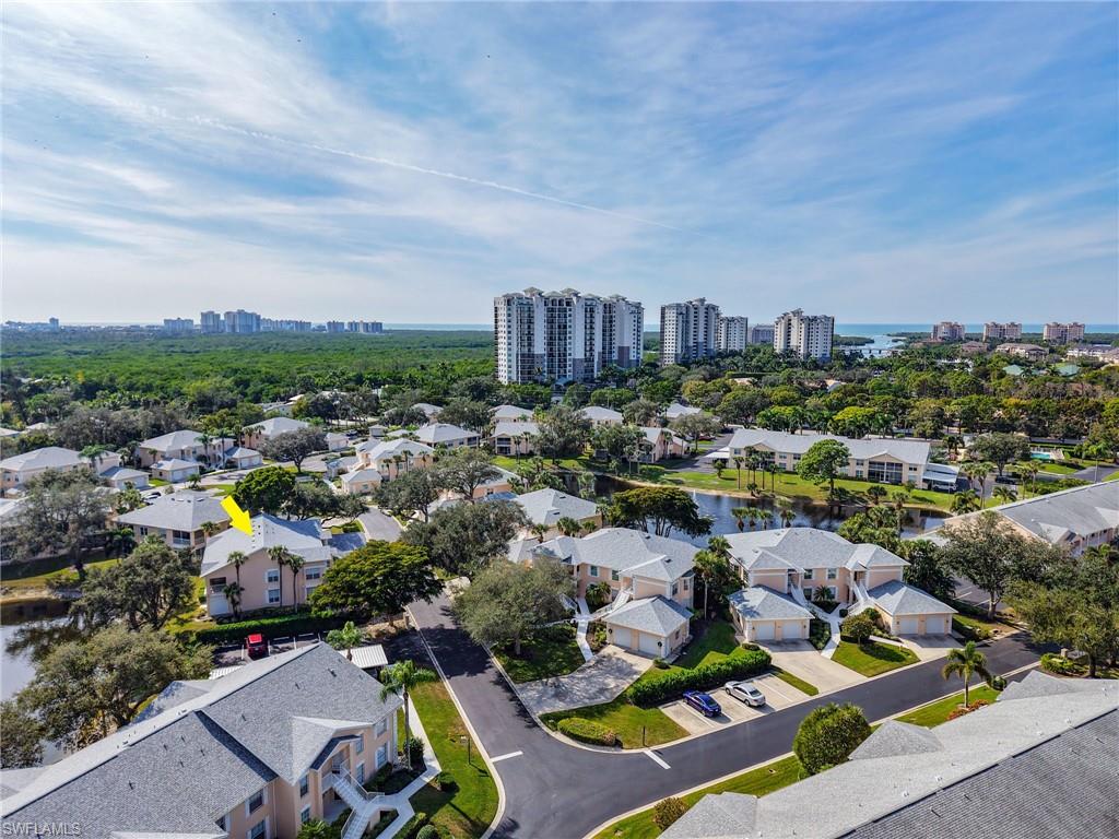 Aerial view of Wiggins Lakes & Preserve with Tarpon Cove (optional membership available) just behind and Wiggins Pass leading to the Gulf just beyond that.