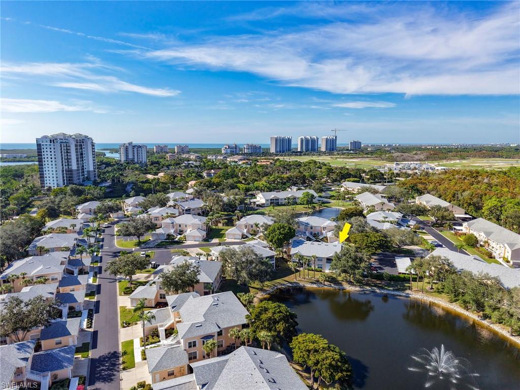Aerial View showing location of unit in proximity to the Gulf.  Located on the lake with water feature.