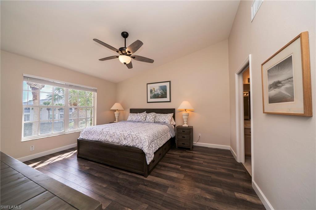Enjoy the lake view from your King Size bed in this large Primary Suite
