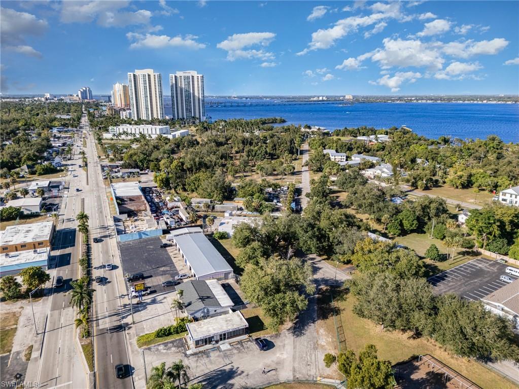 Aerial overview of property's location featuring a nearby body of water