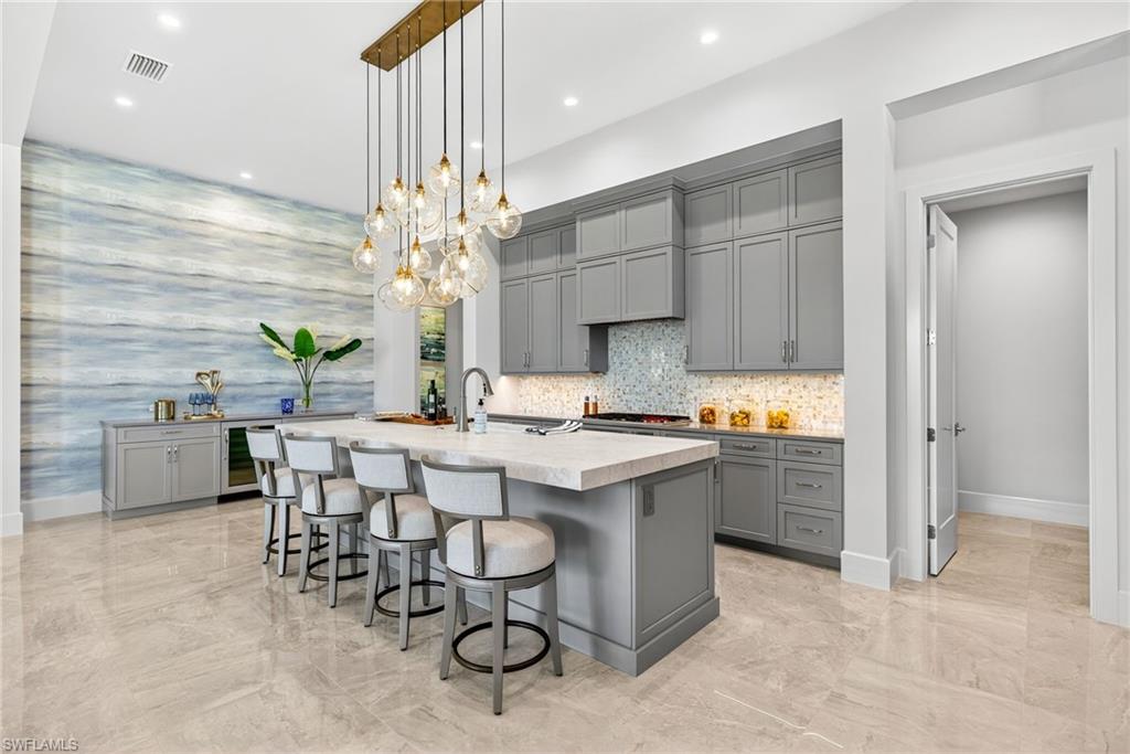 Kitchen with built-in wine/dry bar