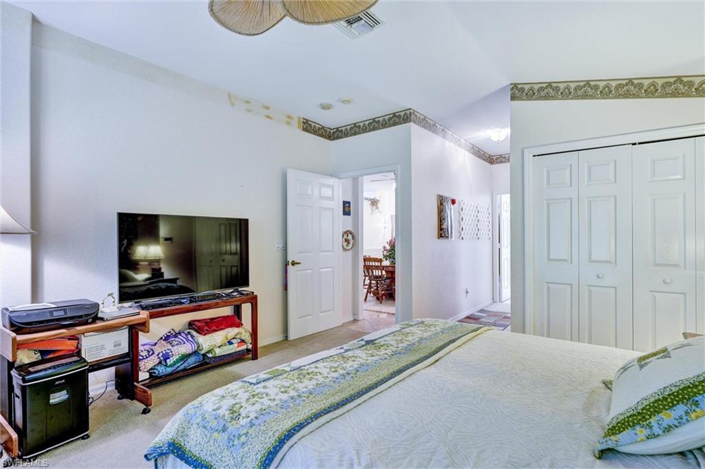 Soft carpeted flooring complemented by light-toned wall finishes