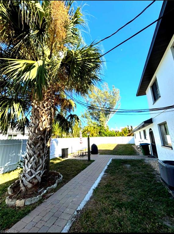 View of fenced backyard