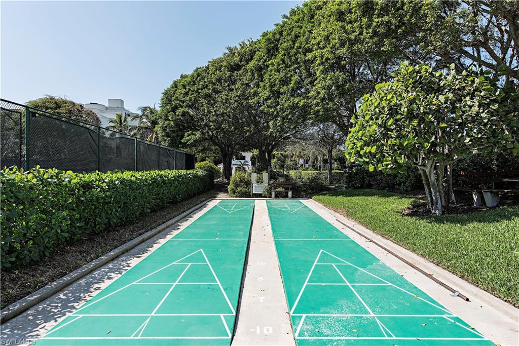 View of home's community featuring shuffleboard