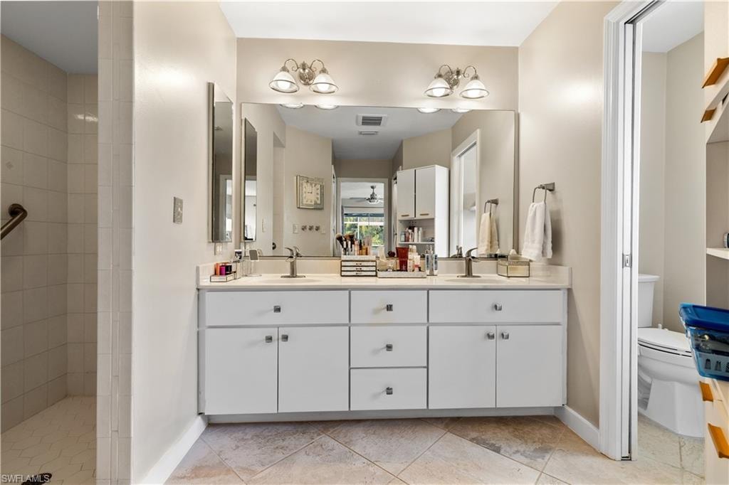 Master Bath with dual sinks, walk in shower.  2 walk in closets just before this view.