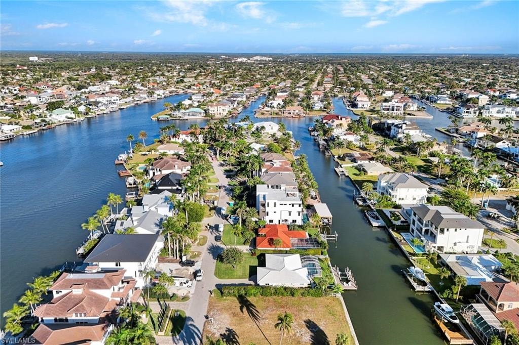 View of property location with nearby suburban area