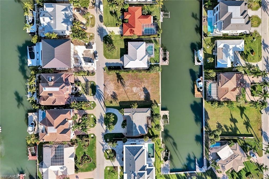 View of property location with nearby suburban area