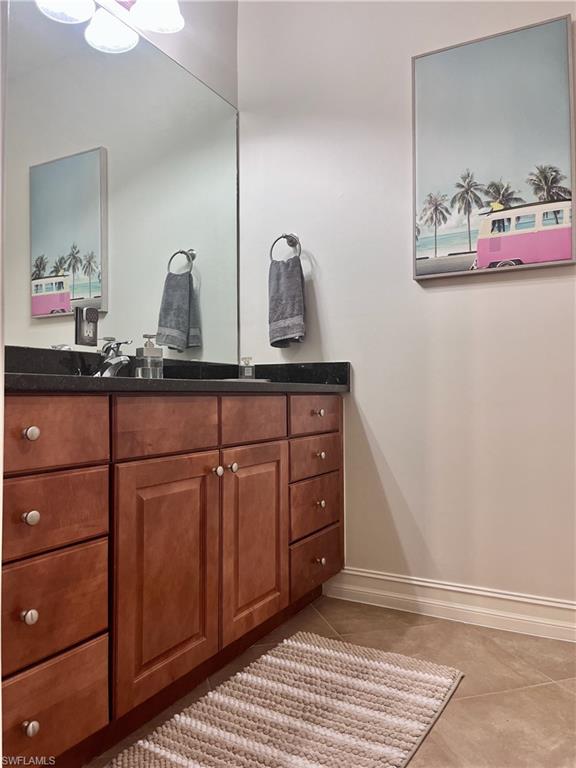 Bathroom with tile  flooring and single vanity