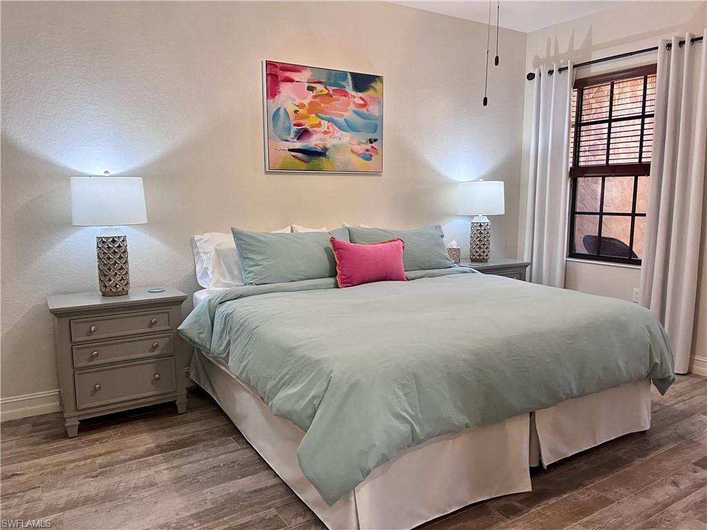 Bedroom featuring hardwood / wood-style floors