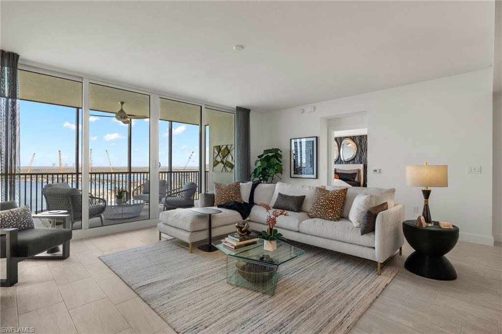 Living room ,large open space, wall to wall sliding glass doors bring in lots of bright light