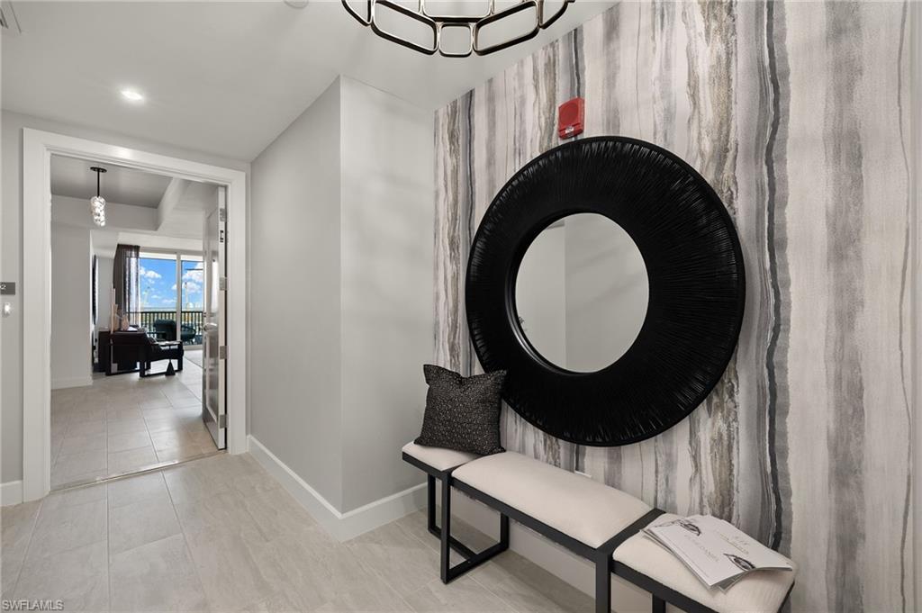 Private entrance features contemporary decor and wallpaper