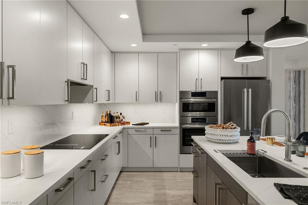 Kitchen space crisp and clean marble countertop and backsplash