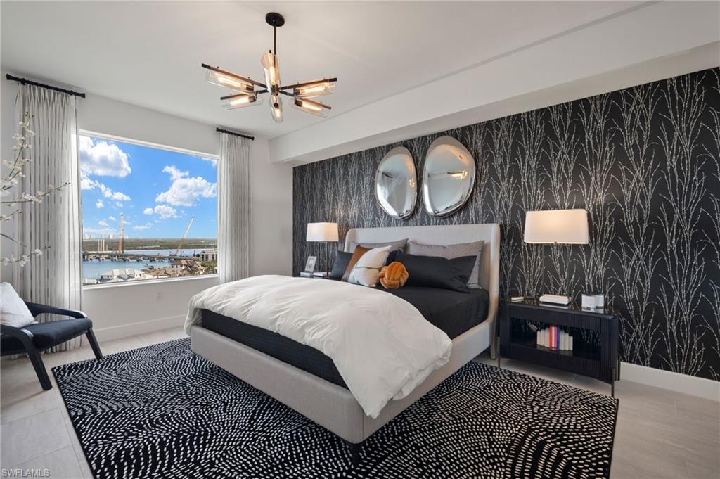 Master Suite features large window with lots of natural lighting , gorgeous statement wallpaper